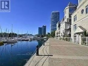 Toronto (Niagara) townhouse for rent - A marina with boats and buildings in the background.
