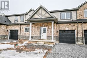 Fort Erie (Crescent Park) house for rent - A house with a grey roof and a white door is shown.