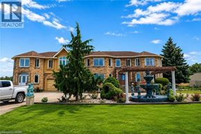 Hamilton apartment for rent - A house with a fountain in front of it.