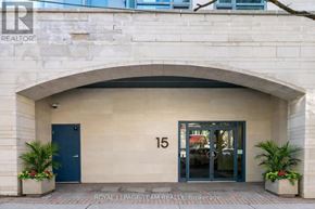 Ottawa condo for rent - The entrance to a building with a stone archway and a number 15 on it.