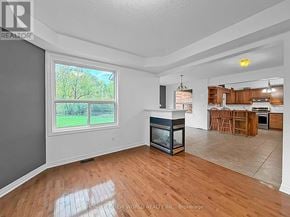 Georgina (Keswick South) apartment for rent - A sunny day outside the window in a room with wooden floors.