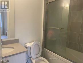 Georgina (Keswick South) apartment for rent - A bathroom with a toilet, sink, and shower.