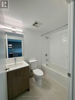 Toronto (Humber Heights) condo for rent - A white bathroom with a toilet, sink, and bathtub.