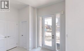Oshawa (Kedron) apartment for rent - A white room with a door leading outside.