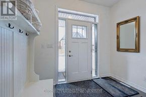 Whitby (Rolling Acres) apartment for rent - A white door with a glass window is open.