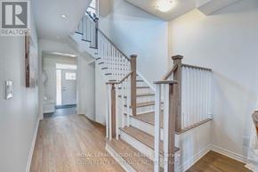Whitby (Rolling Acres) apartment for rent - A spacious hallway with a staircase leading to the second floor.