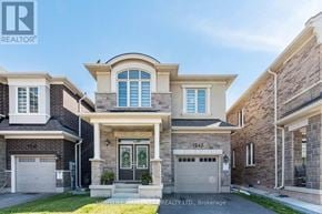 Milton (Bw Bowes) apartment for rent - A modern house with a stone facade and a large front door.