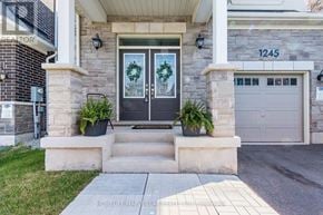 Milton (Bw Bowes) apartment for rent - A house numbered 1245 with a front door and two windows.