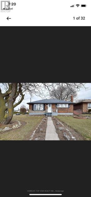 Oshawa (Mclaughlin) apartment for rent - A house with a white door and windows is shown in the image.