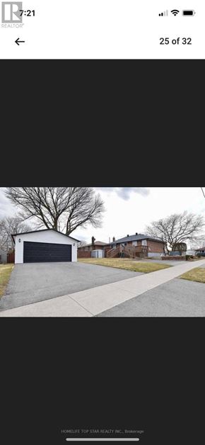 Oshawa (Mclaughlin) apartment for rent - A residential house with a garage is shown in the image.