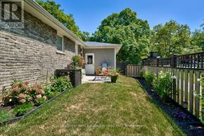 Oakville (Oo Old Oakville) apartment for rent - A house with a lawn and a fence.