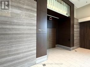 Toronto (Thorncliffe Park) condo for rent - A brown door with West Tower written on it.
