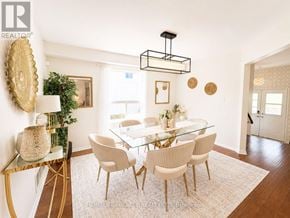 Oshawa (Pinecrest) apartment for rent - A dining room with a glass table and chairs.