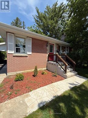 Belleville (Belleville Ward) apartment for rent - A small red brick house with a white window and a porch.