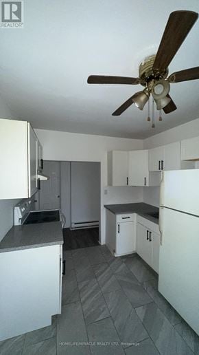 Cambridge apartment for rent - A kitchen with a fan on the ceiling.