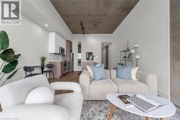 Hamilton apartment for rent - A living room with a white sofa and a coffee table.