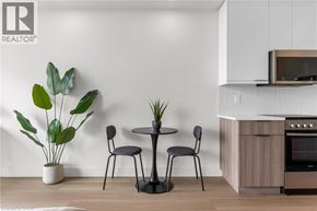Hamilton apartment for rent - A modern kitchen with a table and chairs.