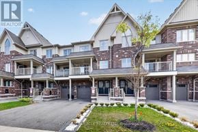 Whitby (Rolling Acres) townhouse for rent - A large, well-maintained apartment complex with multiple buildings and balconies.