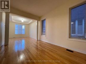 Markham (Cathedraltown) apartment for rent - A room with wooden flooring and a window with blinds.