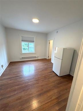 Winnipeg apartment for rent - A room with wooden flooring and a window.