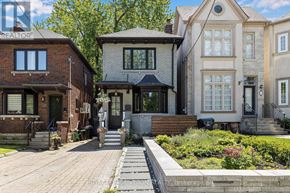 Toronto (Lawrence Park North) apartment for rent - A row of houses with a brick house on the left and a grey house in the middle.