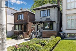 Toronto (Lawrence Park North) apartment for rent - A house with a well-maintained garden in front.