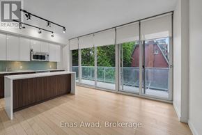 Ottawa condo for rent - A spacious office with a reception desk and sliding glass doors.
