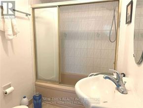 Toronto (Bayview Woods-Steeles) apartment for rent - A bathroom with a sink, toilet, and shower.