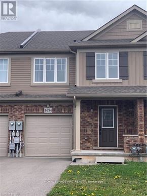 Niagara Falls (Forestview) townhouse for rent - A house with a garage and a door number 6394.