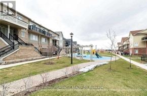 Brampton (Sandringham-Wellington) townhouse for rent - A residential area with apartment buildings and a playground.