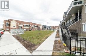 Brampton (Sandringham-Wellington) townhouse for rent - A residential area with houses and apartment buildings.
