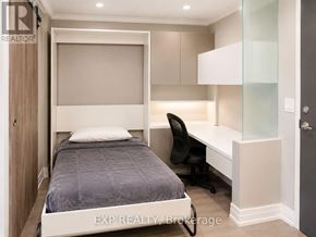 Markham (Unionville) condo for rent - A bedroom with a bed, desk, and chair.