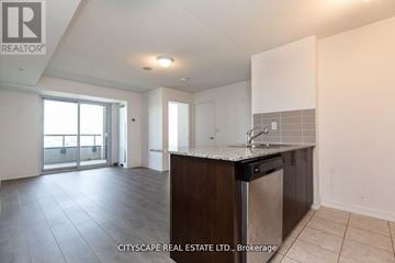 Toronto (Dovercourt-Wallace Emerson-Junction) condo for rent - A kitchen area with a sink and a countertop.