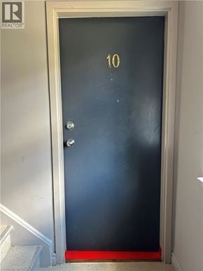Dundas apartment for rent - A black door with a gold number 10 on it.