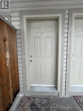 Ottawa townhouse for rent - A white door with a letter B on it.