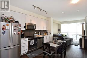 Mississauga (Creditview) condo for rent - A kitchen with a refrigerator, microwave, and oven.