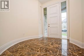 Toronto (Hillcrest Village) apartment for rent - A room with a marble floor and a white door.