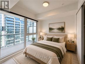 Vaughan (Vaughan Corporate Centre) condo for rent - A bedroom with a large bed and a view of a cityscape through the window.