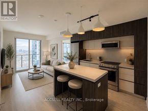 Vaughan (Vaughan Corporate Centre) condo for rent - A modern kitchen with a bar stool and a dining table.