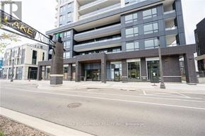 Grimsby (Grimsby Beach) house for rent - A modern building with a glass facade and a street in front of it.