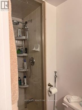 Toronto (Bathurst Manor) condo for rent - A bathroom with a shower and a toilet.