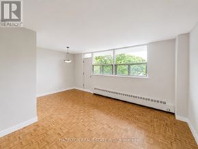 Toronto (Victoria Village) condo for rent - A room with a window and a radiator on the floor.