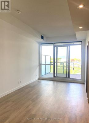 Toronto (Bayview Village) condo for rent - A room with a sliding glass door leading to a balcony.