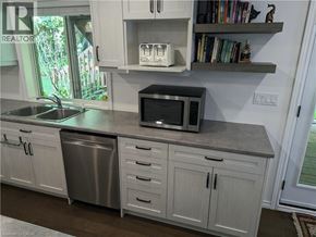 Kitchener apartment for rent - A kitchen with a microwave on the counter.