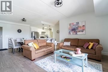Lasalle condo for rent - A living room with two couches and a coffee table.