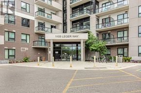 Milton (Fo Ford) condo for rent - The image shows a multi-story building with the name "1105 Leger Way" displayed on a sign in front.