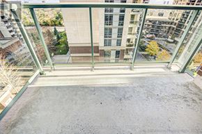 Toronto (Islington-City Centre West) condo for rent - A balcony with a metal railing and a concrete floor.
