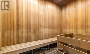 Burlington (Orchard) condo for rent - A sauna with wooden walls and benches.