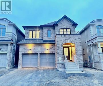 Oshawa (Eastdale) apartment for rent - A modern house with a garage is shown in the image.