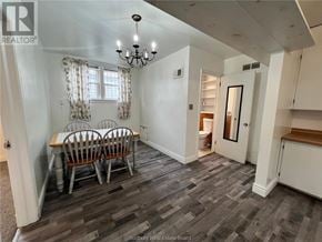 Sudbury apartment for rent - A dining room with a table and chairs.